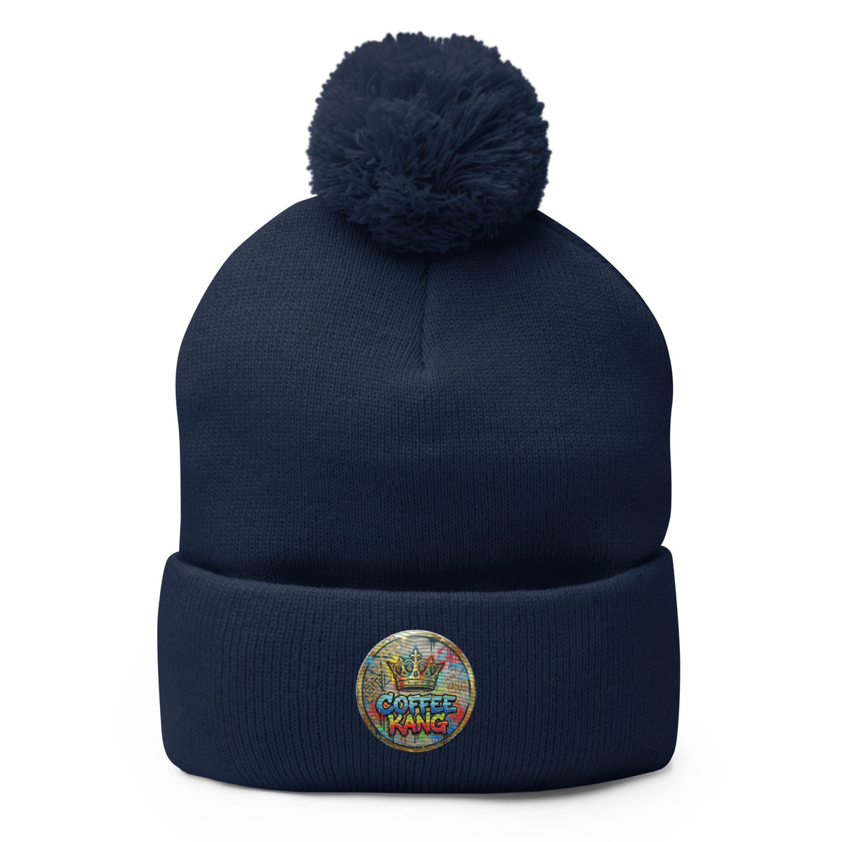 pom-pom beanie knitting in navy blue with a Coffee Kang embroidered logo and fluffy pom-pom on top.
