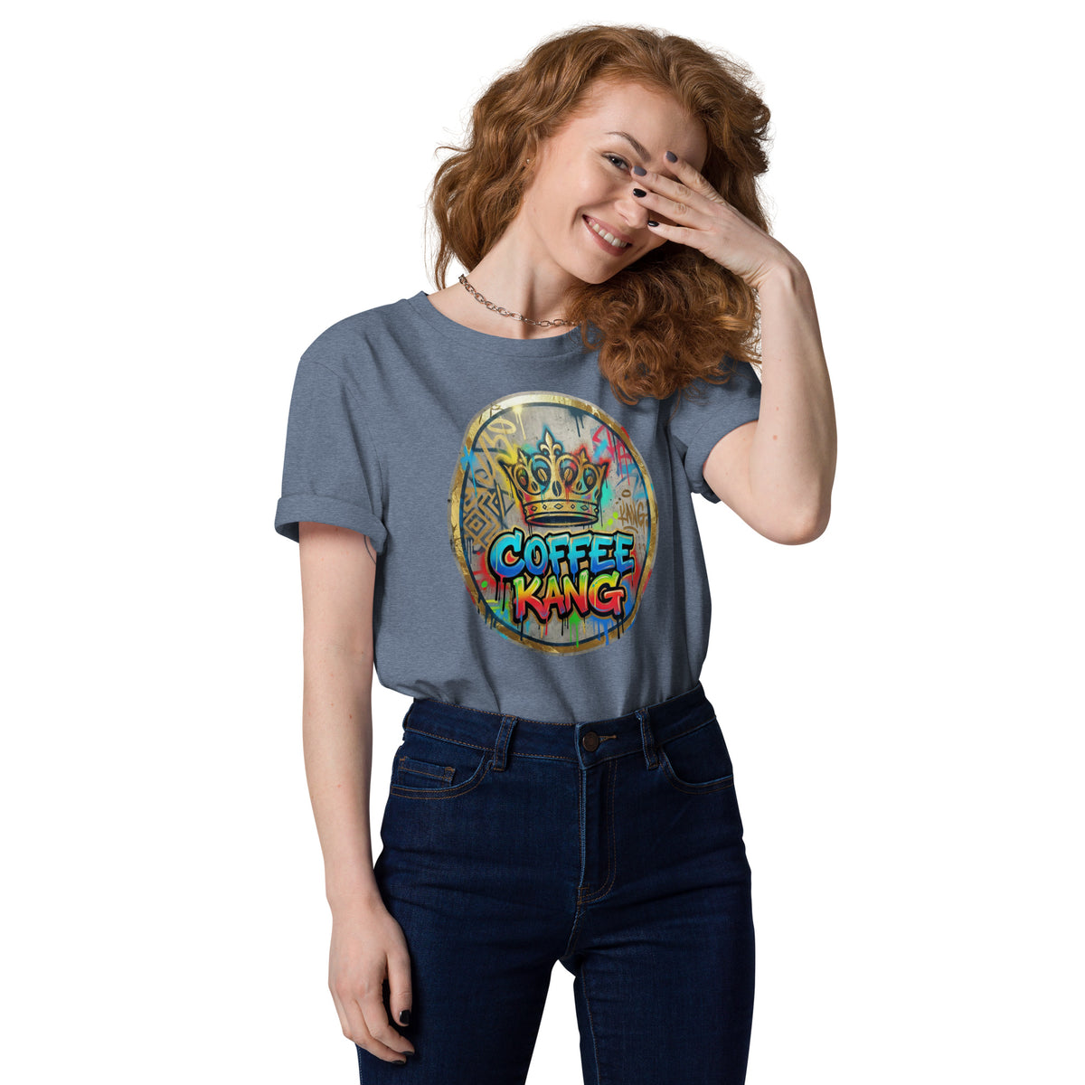 Unisex organic cotton t-shirt featuring a colorful "Coffee Kang" graphic design worn by a smiling model.