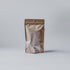 WA example product bag in a sleek, shiny beige packaging, perfect for showcasing contents.