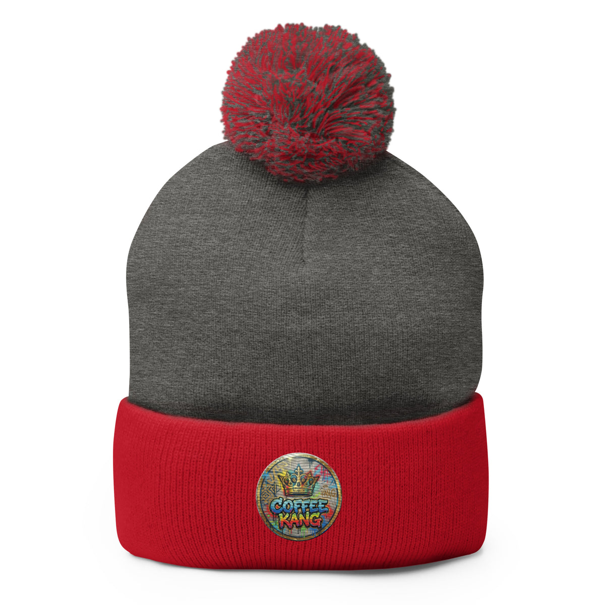 pom-pom beanie knitting featuring a gray top and red cuff with embroidered logo and a fluffy pom-pom on top.
