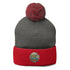 pom-pom beanie knitting featuring a gray top and red cuff with embroidered logo and a fluffy pom-pom on top.